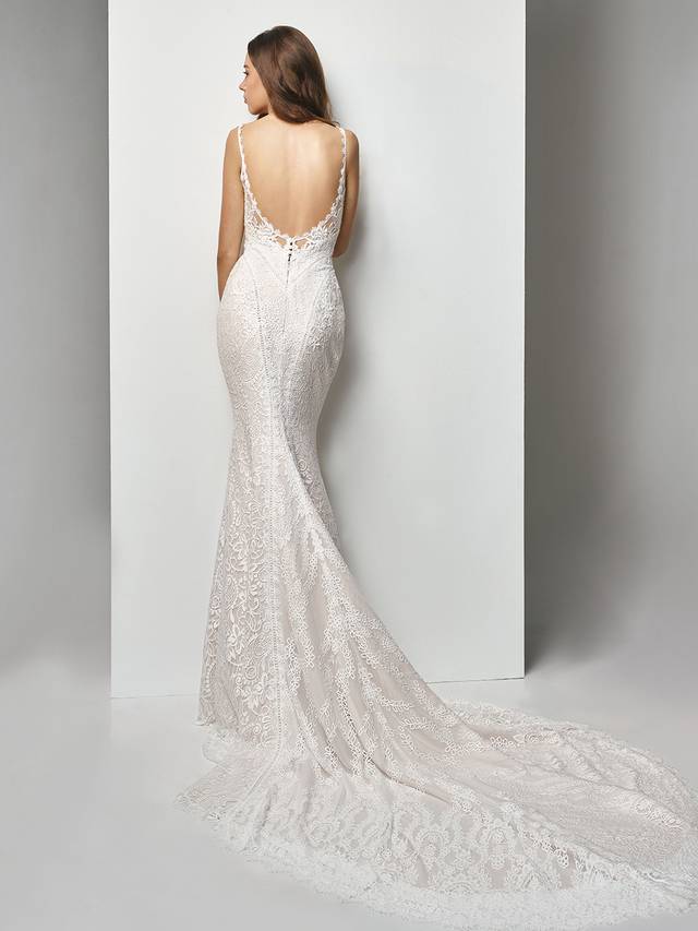 Code: Enzoani Beautiful BT19-04 Code: Enzoani Beautiful BT19-04 It's all in the details for this ultra-sweet, overlace mermaid gown. Stunning embroidered lace placement gorgeously accentuates the low back and lace-trimmed sweetheart neckline while a sweet, cascading train creates a picture-perfect moment.Colour Options : Ivory/Latte OR Ivory/Ivory