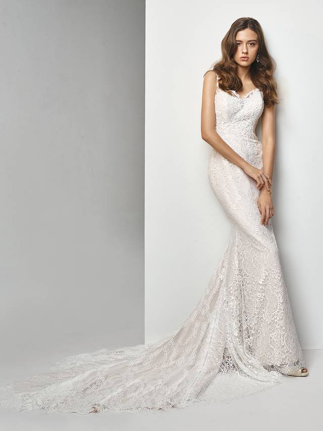 Code: Enzoani Beautiful BT19-04 Code: Enzoani Beautiful BT19-04 It's all in the details for this ultra-sweet, overlace mermaid gown. Stunning embroidered lace placement gorgeously accentuates the low back and lace-trimmed sweetheart neckline while a sweet, cascading train creates a picture-perfect moment.Colour Options : Ivory/Latte OR Ivory/Ivory