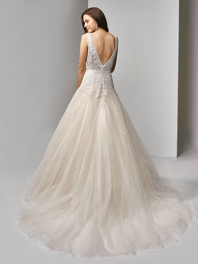Code: Enzoani Beautiful BT19-10 Code: Enzoani Beautiful BT19-10 Sweet floral motifs adorn this modified A-line gown for the most striking, romantic look. The plunging V-neck continues its flattering design to the low V-back where an invisible back zipper closure helps cinch in the waist on the dreamiest, flowing tulle skirt.Colour Options : Ivory/Beige OR Ivory/Ivory