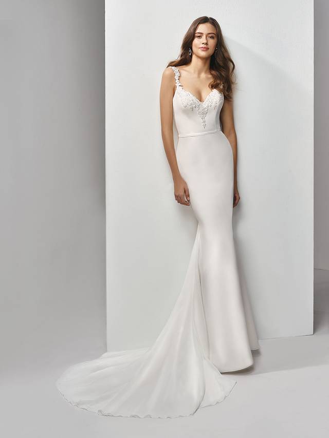 Code: Enzoani Beautiful BT19-17 Code: Enzoani Beautiful BT19-17 Va, va, voom. This full-length mermaid gown perfectly fuses modern minimalism with intricate, feminine detailing. Gorgeously beaded, embroidered lace adorns the sweetheart neckline bodice and sweet straps to bring some flair to the sleek and soft light chiffon fabric of the skirt. A band at the waist helps to flatter the figure even more, while a low V-back trimmed with lace adds extra sex appeal. Finished with an invisible back zipper closure.Colour Options : Ivory