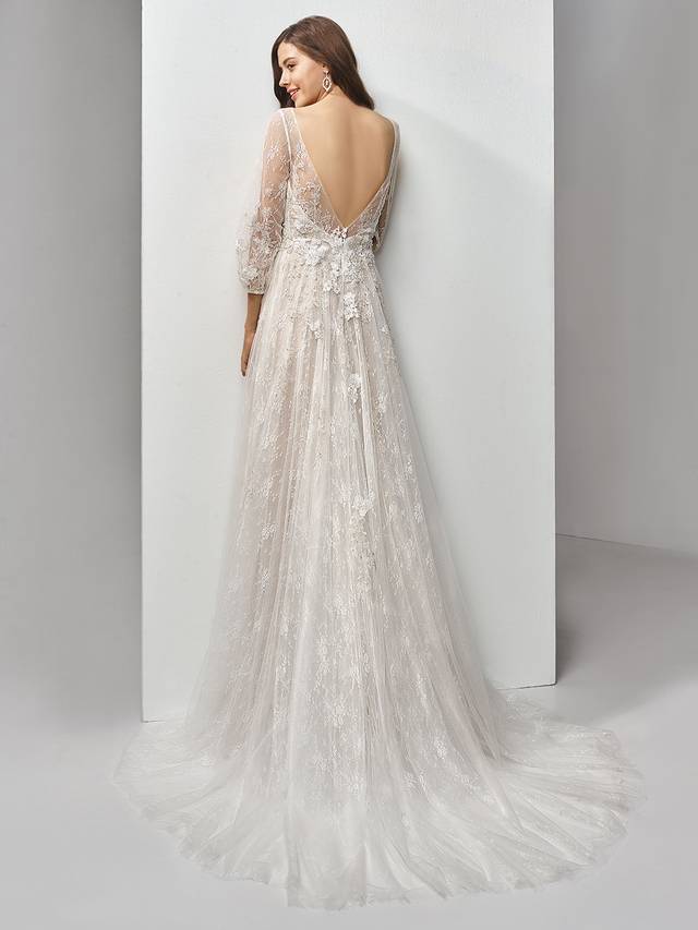 Code: Enzoani Beautiful BT19-18 Code: Enzoani Beautiful BT19-18 Talk about timeless. This full-length, A-line gown is classically gorgeous at every turn, with long lace and tulle bell sleeves for the perfect bohemian fairytale look. An illusion scoop over deep sweetheart neckline adds some modern sexiness, while embroidered lace and chantilly lace sprinkling down to the soft tulle skirt provides all the intricate detailing that will have your guests ooh-ing and aah-ing. The gorgeous low, open V-back is finished with covered buttons and an invisible zipper closure.Colour Options : Ivory/Pewter/Nude OR Ivory/Pewter/Ivory