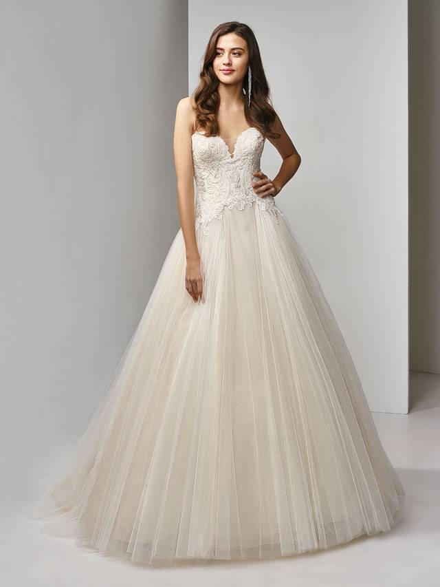 Code: Enzoani Beautiful BT19-21 Code: Enzoani Beautiful BT19-21 Bring out your inner princess in this full A-line ball gown fit for a fairytale. A deep strapless sweetheart neckline provides plenty of allure as the beaded, embroidered lace bodice captures the eye and complements the voluminous, dreamy tulle skirt. The lovely look is finished with an invisible back zipper closure.Colour Options : Ivory/Beige OR Ivory/Ivory