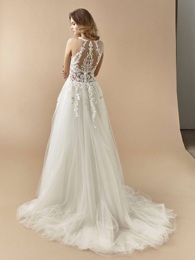 Code: Enzoani Beautiful BT20-10 Code: Enzoani Beautiful BT20-10 Sweet and romantic, this A-line gown features a gorgeous high-neck illusion lace bodice. A jaw-dropping illusion back features covered buttons trailing down the centre, while delicate lace appliques trickle down to the top of the dreamiest tulle skirt.Colour Options: Ivory/Nude OR Ivory/Ivory