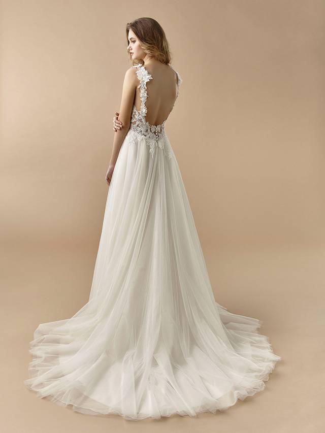 Code: Enzoani Beautiful BT20-26 Code: Enzoani Beautiful BT20-26 Sweet and feminine with all the right floral details. Large floral lace is showcased at the bodice as it leads to a jaw-dropping, beautiful low back. Soft layers of tulle at the skirt add to its whimsical enchantment. The lovely look is complete with lacy floral straps and covered buttons.Colour Options: Ivory/Beige OR Ivory/Ivory