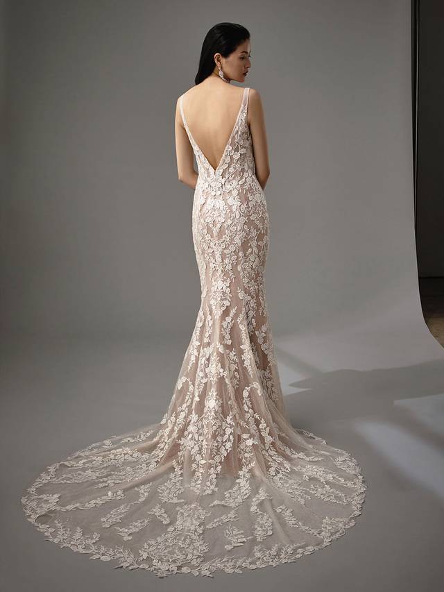 Code: Enzoani Blue - Mirinda Code: Enzoani Blue - Mirinda Whimsical and ethereal, this mermaid gown brings all the romance with its enchanting floral lace and alluring, low V-back. Dazzle and dance the night away in the sparkling glitter tulle skirt. The sweet look is complete with an invisible back zipper closure.Colour Options: Ivory/Nude/Nude OR Ivory/Ivory/Ivory OR Ivory/Ivory/Nude OR Ivory/Sand/Nude