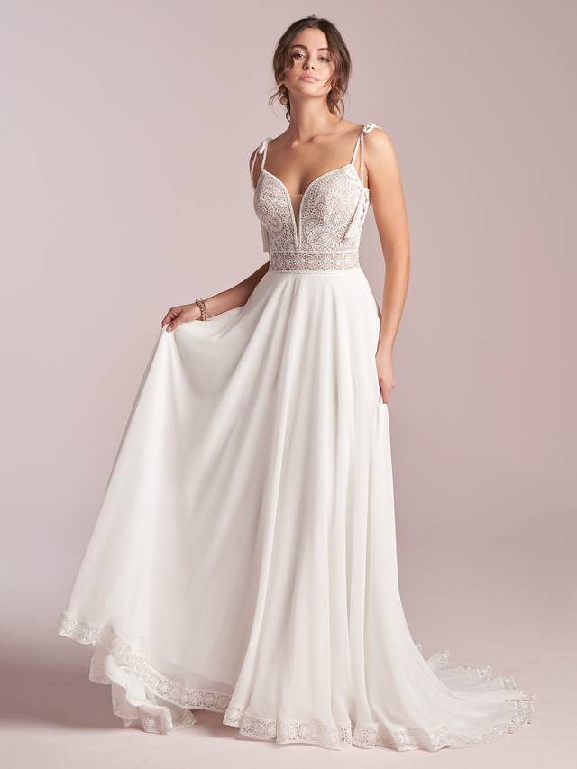 Code: Rebecca Ingram - Jolie - IN STUDIO It's a tricky thing to look delicate and effortless simultaneously, but the payoff is spectacular-á la this chiffon sheath wedding dress in soft lace and heavenly chiffon.Colour Options: Ivory 