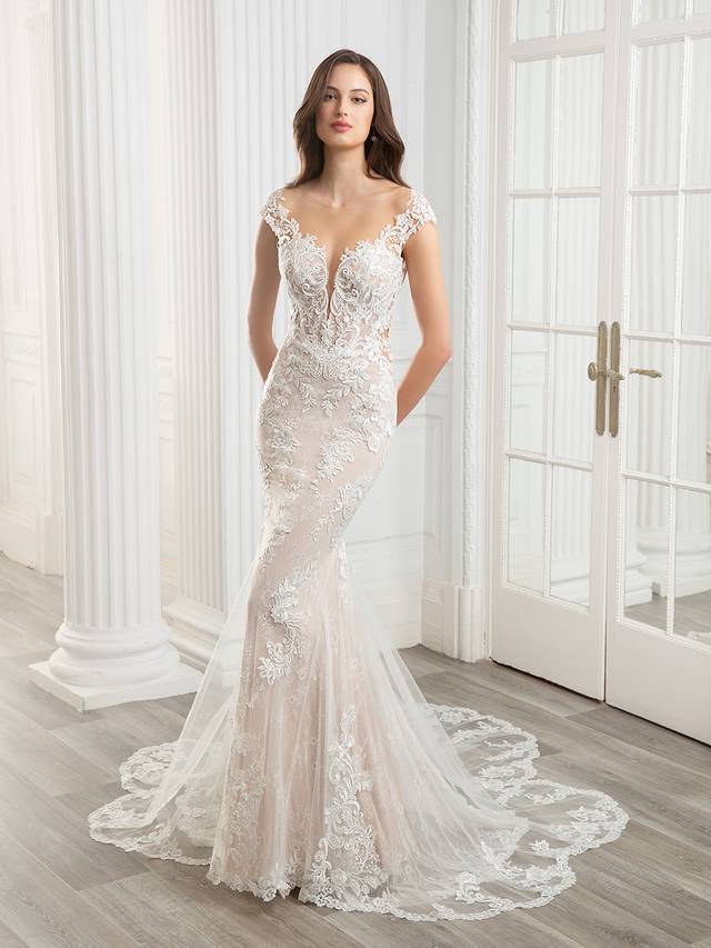 Code: Etoile Cameron - ARRIVING SOON Code: Etoile Cameron - ARRIVING SOON A designer favorite, the stunning CAMERON features a classic, off-shoulder neckline with sparkling hand-beading, as well as exquisite baroque and floral body-contouring lace placement throughout the gown. Finished with a gorgeously dramatic sculpted lace train.Colour Options: Ivory/Nude/Nude OR Ivory/Sand/Nude OR Ivory/Ivory/Nude
