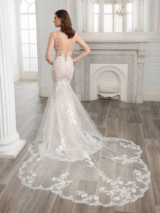 Code: Etoile Sydney - ARRIVING SOON Code: Etoile Sydney - ARRIVING SOON Sweet, sexy, and ultra-romantic. SYDNEY evokes effortless elegance with a high illusion neckline with delicate, sparkling hand beading. Gorgeous body-contouring baroque lace is thoughtfully placed throughout the gown, sprinkling down from the bodice down to the signature ÉLYSÉE double sculpted train. Colour Options: Ivory/Nude/Nude OR Ivory/Sand/Nude OR Ivory/Ivory/Nude