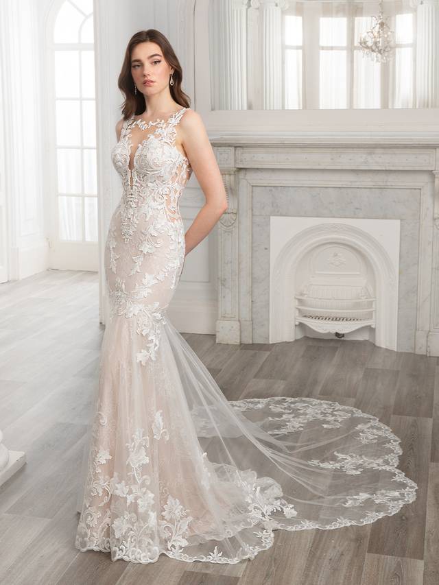 Code: Etoile Sydney - ARRIVING SOON Code: Etoile Sydney - ARRIVING SOON Sweet, sexy, and ultra-romantic. SYDNEY evokes effortless elegance with a high illusion neckline with delicate, sparkling hand beading. Gorgeous body-contouring baroque lace is thoughtfully placed throughout the gown, sprinkling down from the bodice down to the signature ÉLYSÉE double sculpted train.Colour Options: Ivory/Nude/Nude OR Ivory/Sand/Nude OR Ivory/Ivory/Nude