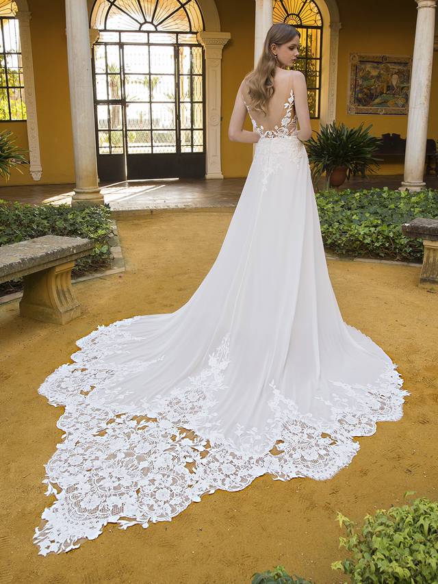 Code: Blue By Enzoani Patricia Code: Blue By Enzoani Patricia A relaxed take on our beloved A-line silhouettes, Patricia features a 3D floral embroidered lace unlike any other gown. This whimsical wedding dress features a chiffon skirt that falls effortlessly, meeting an intricate and exquisite train. Don’t miss out on the delicate illusion straps that lead into a sultry plunging V-back. Colour Options: Ivory/Nude OR Ivory/Ivory