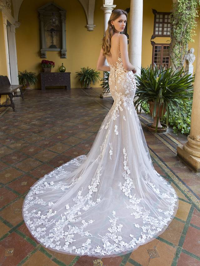 Code: Blue By Enzoani Pierce Code: Blue By Enzoani Pierce Angelic & divine… Meet our Pierce. This figure-enhancing wedding gown features a beaded cotton lace all over with sexy illusion straps and an unforgettable plunging neckline. Not only does this lacy goddess feature sparkling tulle, but she also includes striking side panels for added glamour.Colour Options: Ivory/Nude/Nude OR Ivory/Ivory/Nude OR Ivory/Ivory/Ivory OR Ivory/Sand/Nude