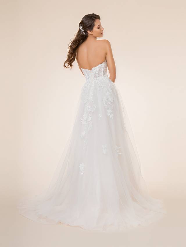 Code: Moonlight Tango T868 Code: Moonlight Tango T868 You’re sure to fall in love with the beautifully sculpted sweetheart neckline, the flowing layers of the A-line skirt, and the re-embroidered lace appliques perfectly placed throughout the dress. Sequin accents will shimmer and shine with every step you take, as the romantic sweep train glides down the aisle behind you.Colour Options: Ivory/Taupe/Rose OR Ivory/Ivory/Ivory OR White/White/White