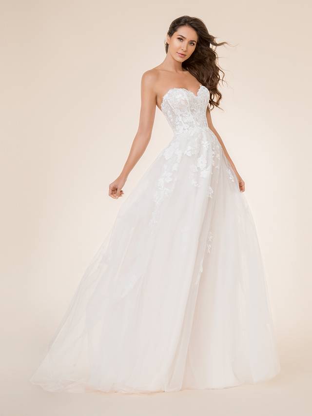 Code: Moonlight Tango T868 Code: Moonlight Tango T868 You’re sure to fall in love with the beautifully sculpted sweetheart neckline, the flowing layers of the A-line skirt, and the re-embroidered lace appliques perfectly placed throughout the dress. Sequin accents will shimmer and shine with every step you take, as the romantic sweep train glides down the aisle behind you.Colour Options: Ivory/Taupe/Rose OR Ivory/Ivory/Ivory OR White/White/White